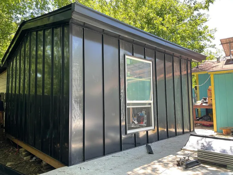 Black standing seam metal wall panels for Roof Inspection in Columbia